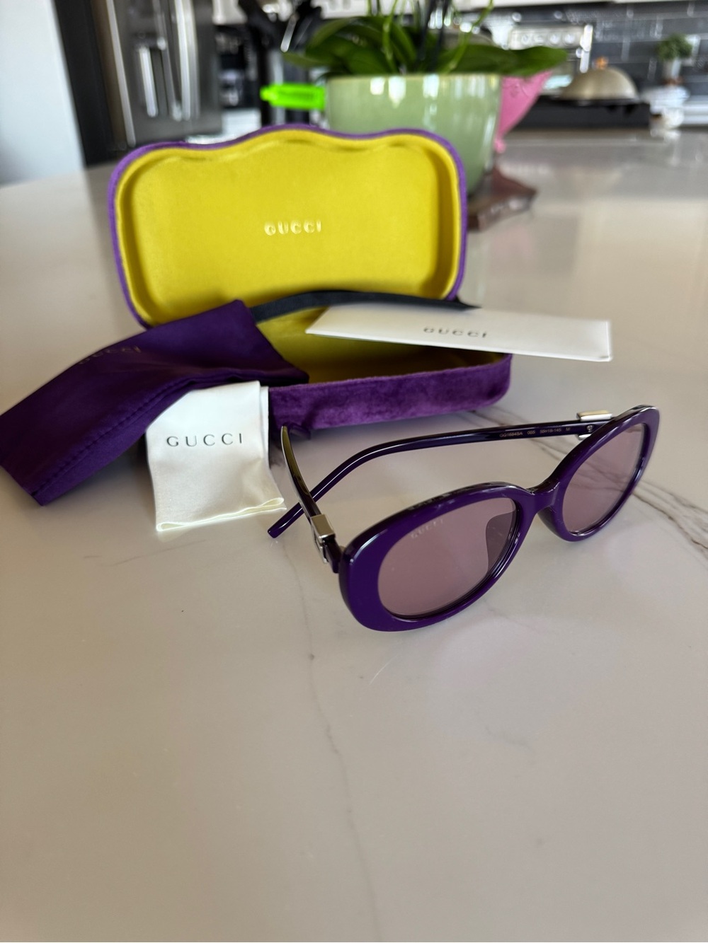 Gucci Purple Round Sunglasses with Silver Accents